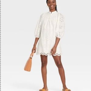 White cotton eyelet dress. 3/4 puff sleeve